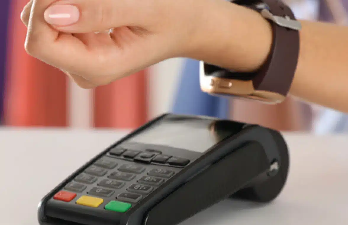 Mobile wallet on smartwatch being used to make contactless payment in Egypt