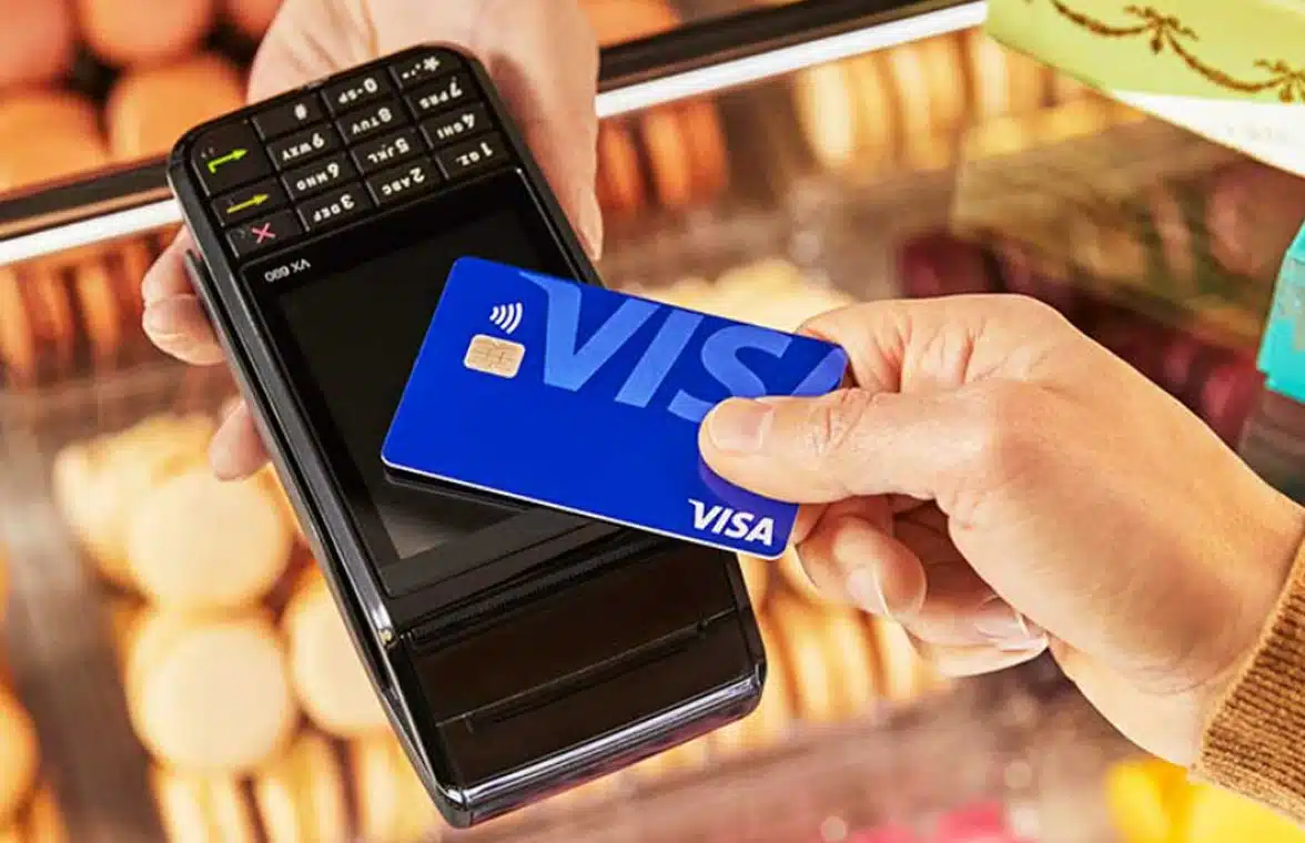Cashless payment being made using contactless Visa debit card  in Singapore