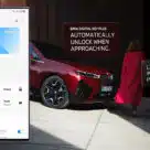 BMW car with inset of a UWB digital car key on an Android device
