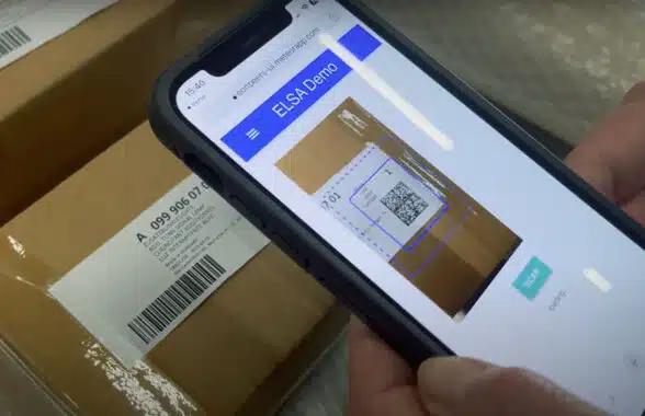 Qr code on a parcel being scanned as part of the EU open source product authentication platform supply chain tracking project