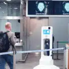 Passengers approaching a biometric Smartcheck reader at London St Pancras International rail station