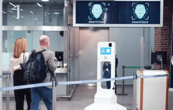 Passengers approaching a biometric Smartcheck reader at London St Pancras International rail station