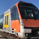 close up of an orange and grey Transport for NSW train