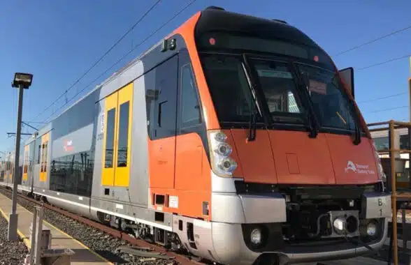 close up of an orange and grey Transport for NSW train
