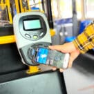 Smartpone using Clipper pass for contactless fare payment on a bus