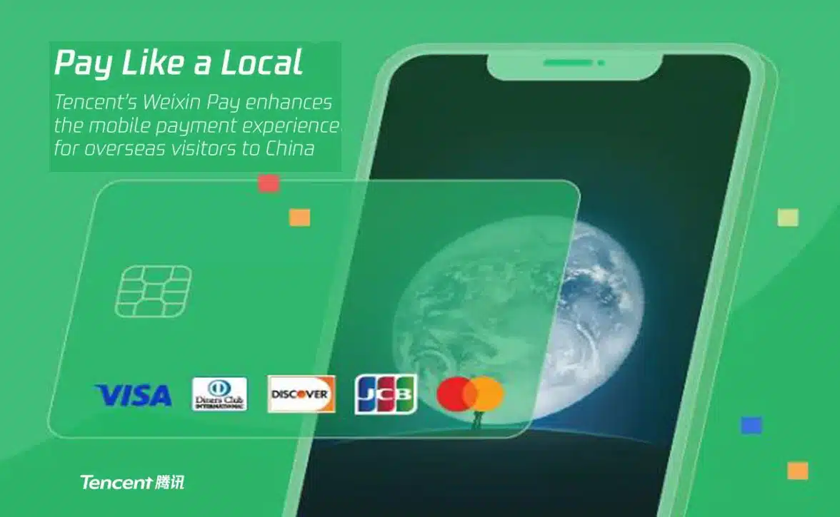 Tencent WeChat Pay / Weixin Pay advert with credit card and smartphone and visa, Discover, Mastercard and JCB credit card logos