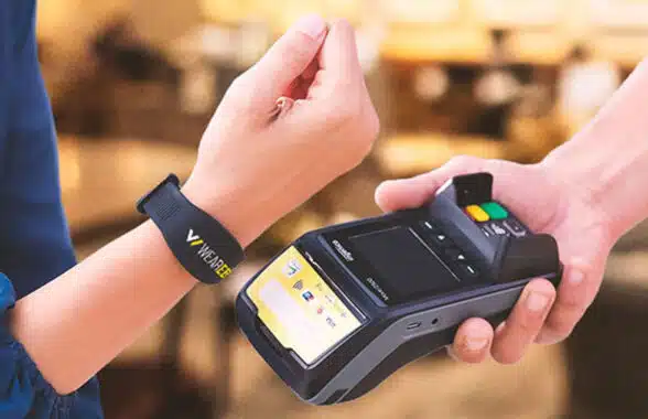 Contactless payment being made using an NFC wristband