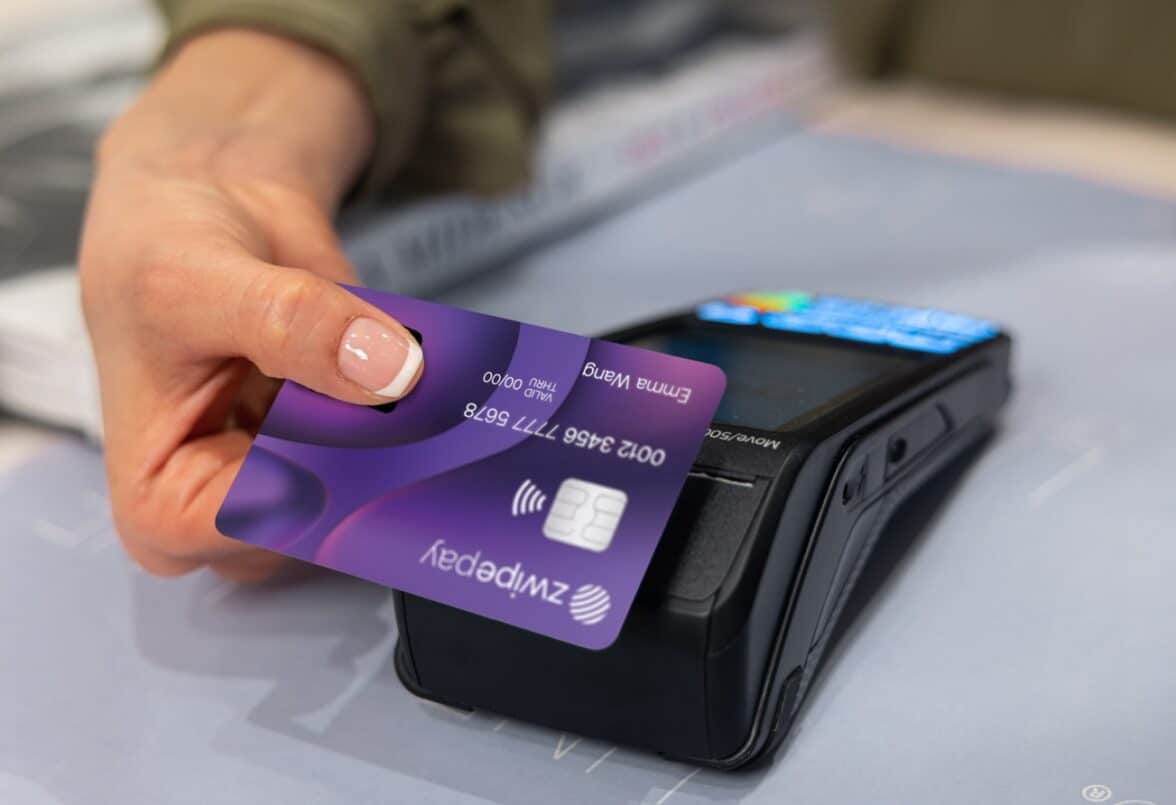 Customer transacting with a Zwipe Pay branded biometric card